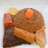 Jollof With Fish  · Chep/Jollof served with fish, carrots, cassava and Cabbage