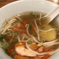 Vietnamese Style Hot, & Sour Soup · Shrimp or fish, pineapples, beansprouts, and tomatoes - Sweet, hot, and sour soup.