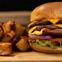 Triple Stack Burger · Three juicy, steakburger patties stacked with American cheese, red onions, lettuce, tomato, ...