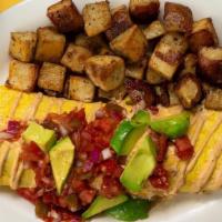 Baja Chicken Omelet · A four-egg omelet loaded with bacon, andouille sausage, mushrooms, home fries, pepper jack c...