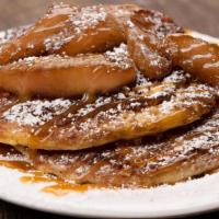 Caramel Apple Pancakes · Two buttermilk pancakes with apple pie crumble griddled-in for a crispy crunch, topped with ...