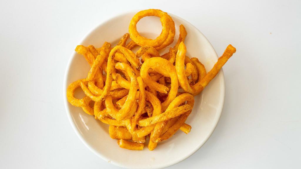 Cajun Fries · Seasoned crispy curly fries