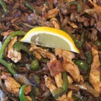 Fajitas Lunch · We use our special recipe to cook tender strips of marinated chicken breast or beef steak, w...