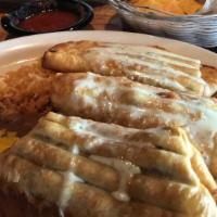 Chimichanga · A flour tortilla stuffed with spicy chicken or beef chunks, then deep fried to a golden brow...