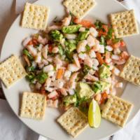 Ceviche · Shrimp served with onions, tomatoes, cilantro, and lime juice.