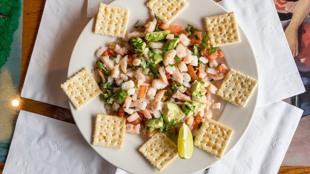 Ceviche · Shrimp served with onions, tomatoes, cilantro, and lime juice.