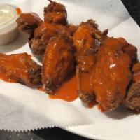 Wings Bone-In Or Boneless (10) · BBQ, Buffalo, Lemon Pepper or Garlic Parmesan. Served with side of Ranch or Blue Cheese