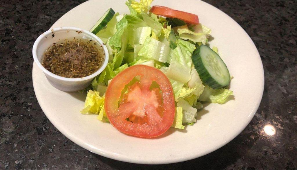 House Salad ( Small Or Large) · Mixed greens ,tomatoes, cucumbers and dressing of your choice.