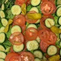 House Salad · Mixed Greens, Tomatoes, Cucumber & Dressing
