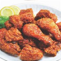 Lunch Wing Red Hot Pepper · 5 PCS wings with Red Hot Pepper Sauce two choices of sides for French Fries or Rice and Cole...