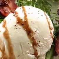 Homemade Burrata · Made fresh daily, we start wing our own fresh mozzarella balls & fill them with a mixture of...