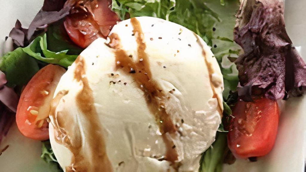 Homemade Burrata · Made fresh daily, we start wing our own fresh mozzarella balls & fill them with a mixture of creamy ricotta cheese, fresh herbs & Parmesan. Great added to a side of vegetables or on top of your salad, pasta or pizza.