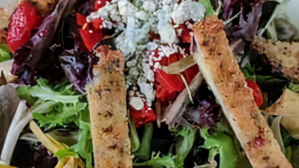 Angelina Insalata · Fresh spring mix with a delicious combination of breaded eggplant, tomatoes, sliced red pepper, artichoke hearts & gorgonzola cheese. Served with balsamic vinaigrette