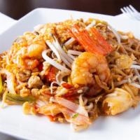 Pad Thai   · Rice Noodle With Beansprout, Onion, Egg, Crushed Peanut In House Signature Red Sauce. (Ask F...
