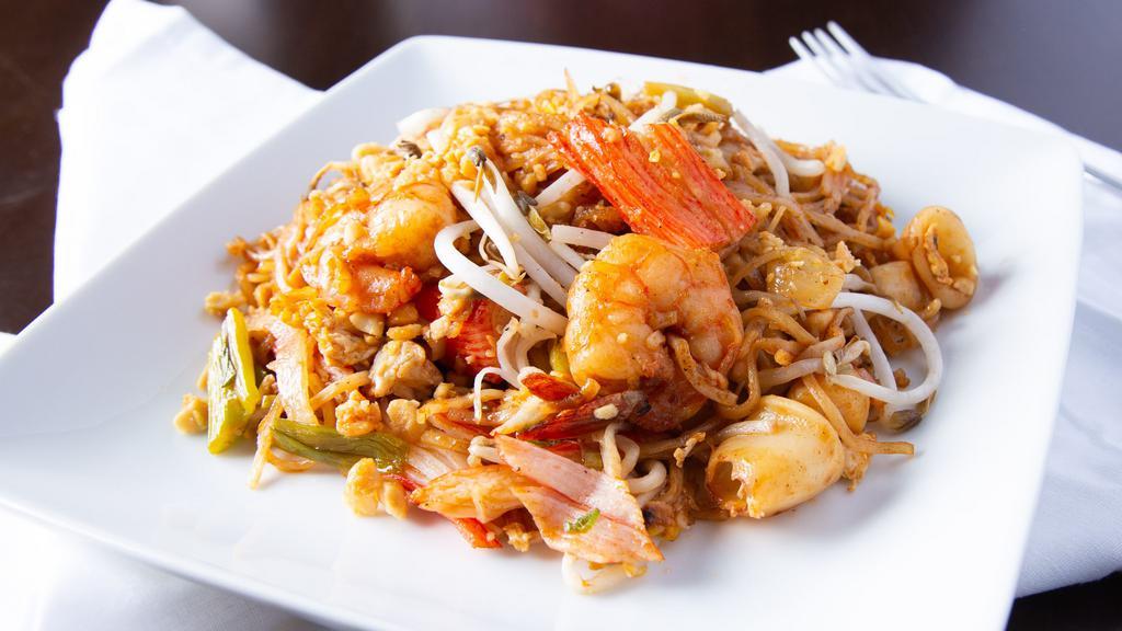 Pad Thai   · Rice Noodle With Beansprout, Onion, Egg, Crushed Peanut In House Signature Red Sauce. (Ask For Thai Style)