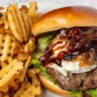 Corner Bar Bbq Burger* · Our house-made bbq sauce with herbal goat cheese, baby arugula and caramelized shallots on a...