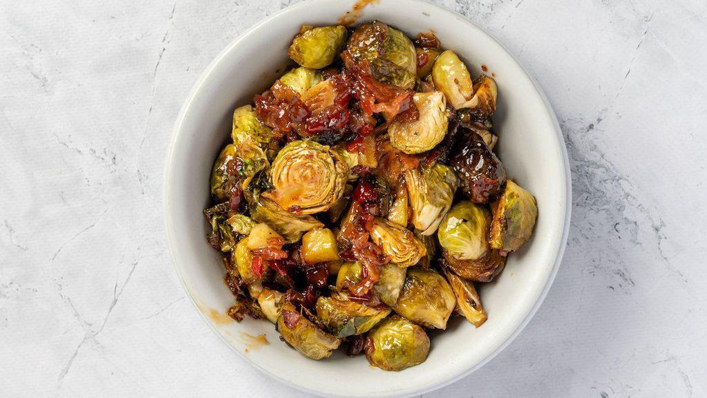 Caramelized Brussels Sprouts · Smoked bacon jam, granny smith apple and a brown sugar glaze.