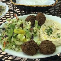 Falafel · Deep fried chickpeas served on lettuce with tahini sauce.