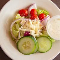House Salad · Tomatoes, onions, and cucumbers topped with parmesan cheese.