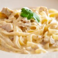 Fettuccine Alfredo · Fresh fettuccine noodles covered with creamy Alfredo sauce. Add chicken for an additional ch...