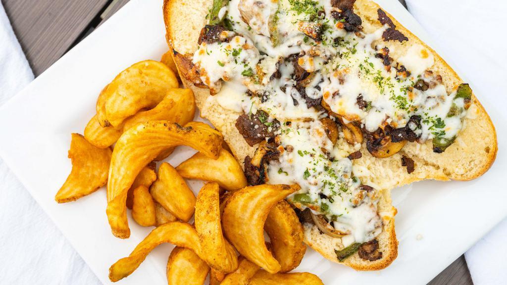Philly Cheesesteak · onions, green peppers, mushrooms, provolone cheese, and mayo.