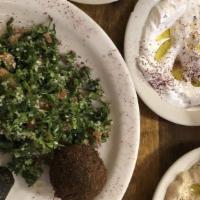 Olive Appetizers · Hummus, baba ganoush, grape leaves, tabouli, falafel. .