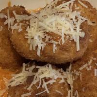 Mac & Cheese Balls · Bleu monkey favorite. Southern comfort at its finest, homemade mac and cheese rolled, breade...