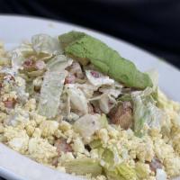 Cobb Salad · Chicken breast, avocado, bleu cheese, bacon, tomato, egg, and lettuce. Tossed in our housema...