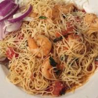 Shrimp With Angel Hair · Large shrimp sautéed with herbs, lemon and garlic combined with angel hair pasta in a tomato...
