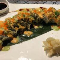Fire Roll · Spicy. 12 pieces. Spicy crab, avocado, cream cheese, spicy craw fish, deep fried, topped wit...