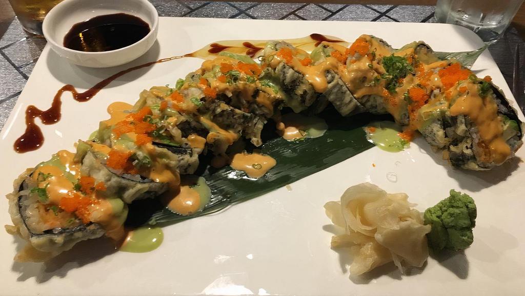 Fire Roll · Spicy. 12 pieces. Spicy crab, avocado, cream cheese, spicy craw fish, deep fried, topped with spicy mayonnaise, wasabi mayonnaise, caviar, and scallion.