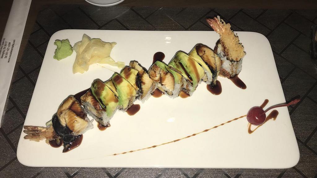 Black Dragon Roll · Shrimp tempura, cucumber, topped with eel, avocado, eel sauce, and sesame seed.