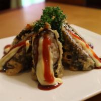 Spicy Volcano Roll · White fish, crab stick then tempura fried