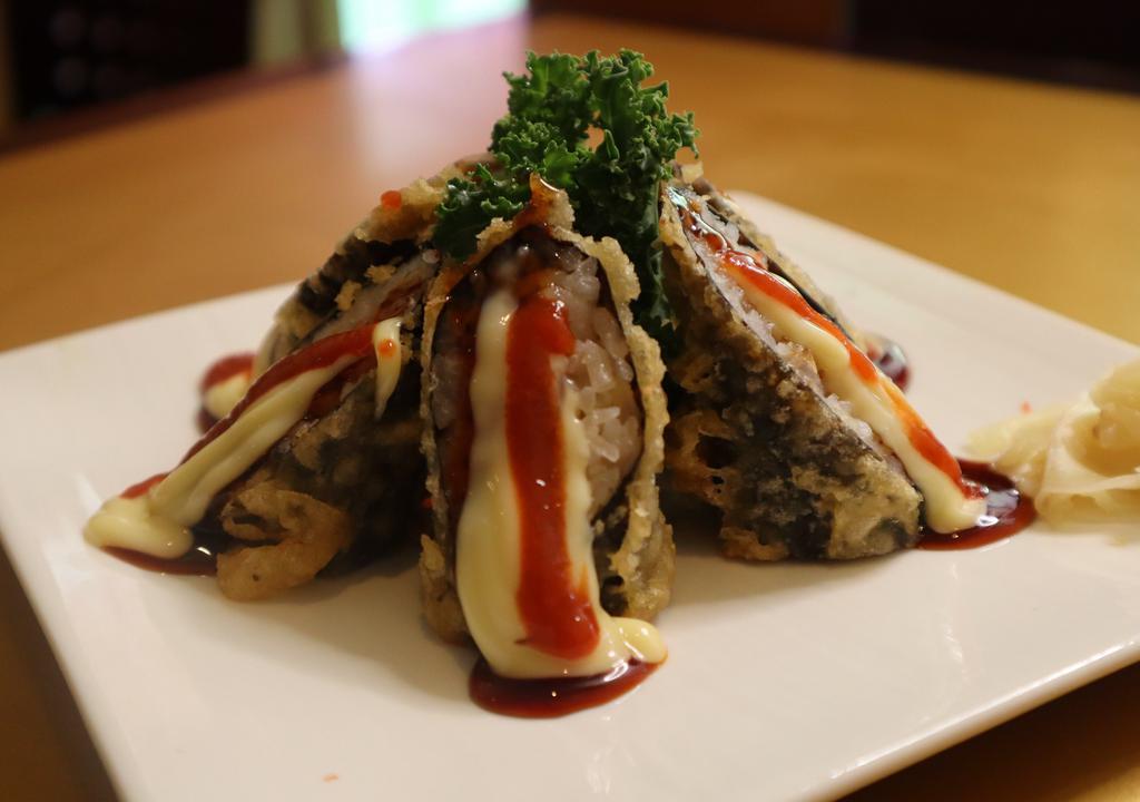 Spicy Volcano Roll · White fish, crab stick then tempura fried