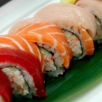 Sr10. Rainbow Roll · Crab stick, avocado, cucumber with tuna, salmon, shrimp, white fish and masago outside.