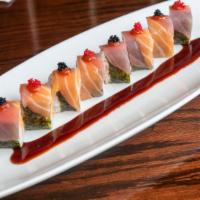 Halloween Roll · Spicy crab, sushi shrimp and tempura crunchy inside, slices of fresh salmon, tuna, black tob...