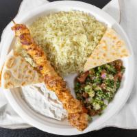 Rice & Salad · Seasoned Rice, Greek Salad or( Tabouli and Tzatziki Sauce), Pita,  Choice of Chicken, Steak ...