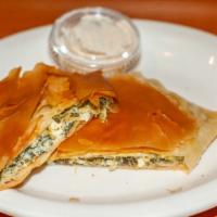 Spinach Pie · Made with filo dough and filled with spinach & feta cheese.