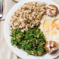 Veggie Platter · Tabouli, lentils & rice, hummus, falafel & pita bread.