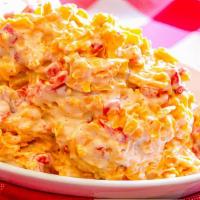 Pimento Cheese · Southern classic pimento cheese dip served with tortilla chips,