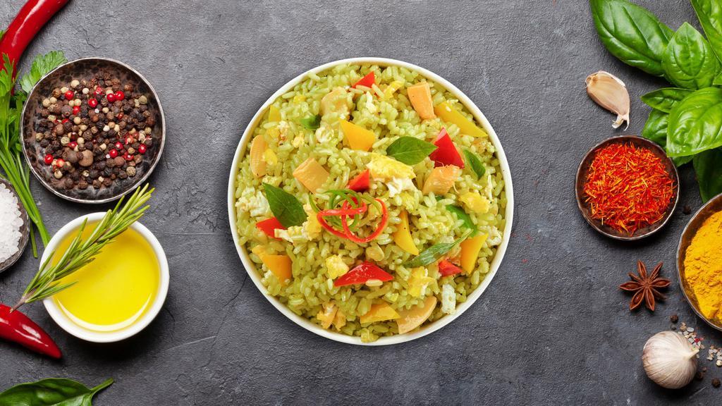 Green Spice Curry Fried Rice · Stir fried rice with egg, basil, bell pepper, bamboo shoot and green curry paste. Spicy.