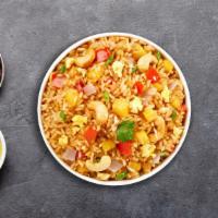 Pineapple Summer Fried Rice · Stir fried rice with egg, pineapple, cashew nut, onion, scallion and tomato.