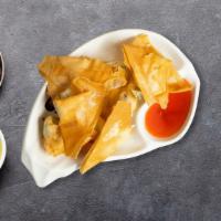 Fried Crab Wonton · 5 pieces of crispy wontons stuffed with cream cheese, crab meat, onion, red bell pepper, and...