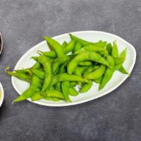 Edamame · Soy beans in the pod with garlic sauce.