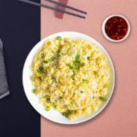 Egg Ritzy Fried Rice · Stir fried rice with savory egg.