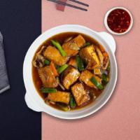Sizzle My Wok · Tender tofu sautéed with sliced chicken and shrimp in a light brown sauce with mix vegetables.