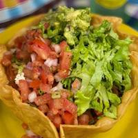 Taco Salad · crispy flour tortilla, picadillo ground beef or shredded chicken, rice, beans, bell peppers,...