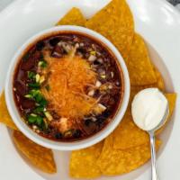 Chili Soup - Cup · Hearty homemade beef chili, black beans, kidney beans, tomatoes, green peppers, onions and s...