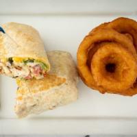 Chicken Wrap · Marinated chicken breast in a flour tortilla with homemade ranch, shredded romaine, diced to...