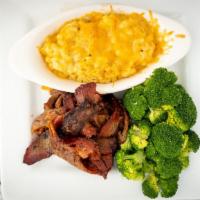 Brisket Platter · Tender smoked beef brisket dipped in sweet BBQ sauce served with jalapeno mac and cheese and...